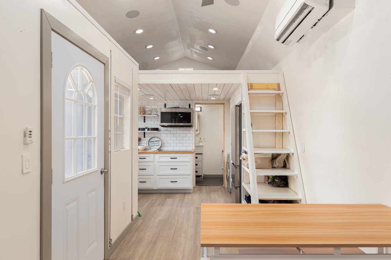 Open-plan tiny home interior by WFM Homes